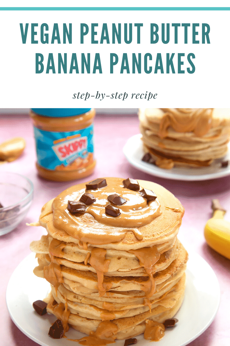 A stack of vegan peanut butter banana pancakes on a white plate. The stack is drizzled with more peanut butter and scattered with chunks of vegan chocolate. The caption reads: vegan peanut butter banana pancakes step-by-step recipe.