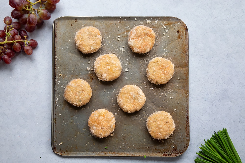 Baking tray with the mackerel fishcakes drizzled in olive oil.  